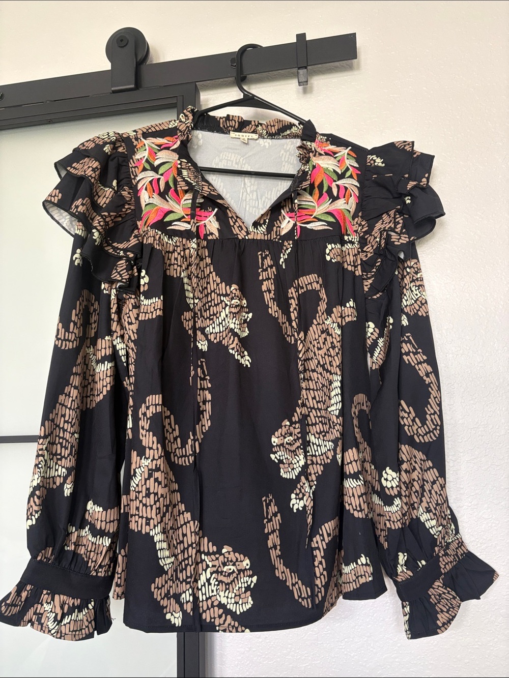 JODIFL Black Printed Blouse with Embroidered Floral Yoke